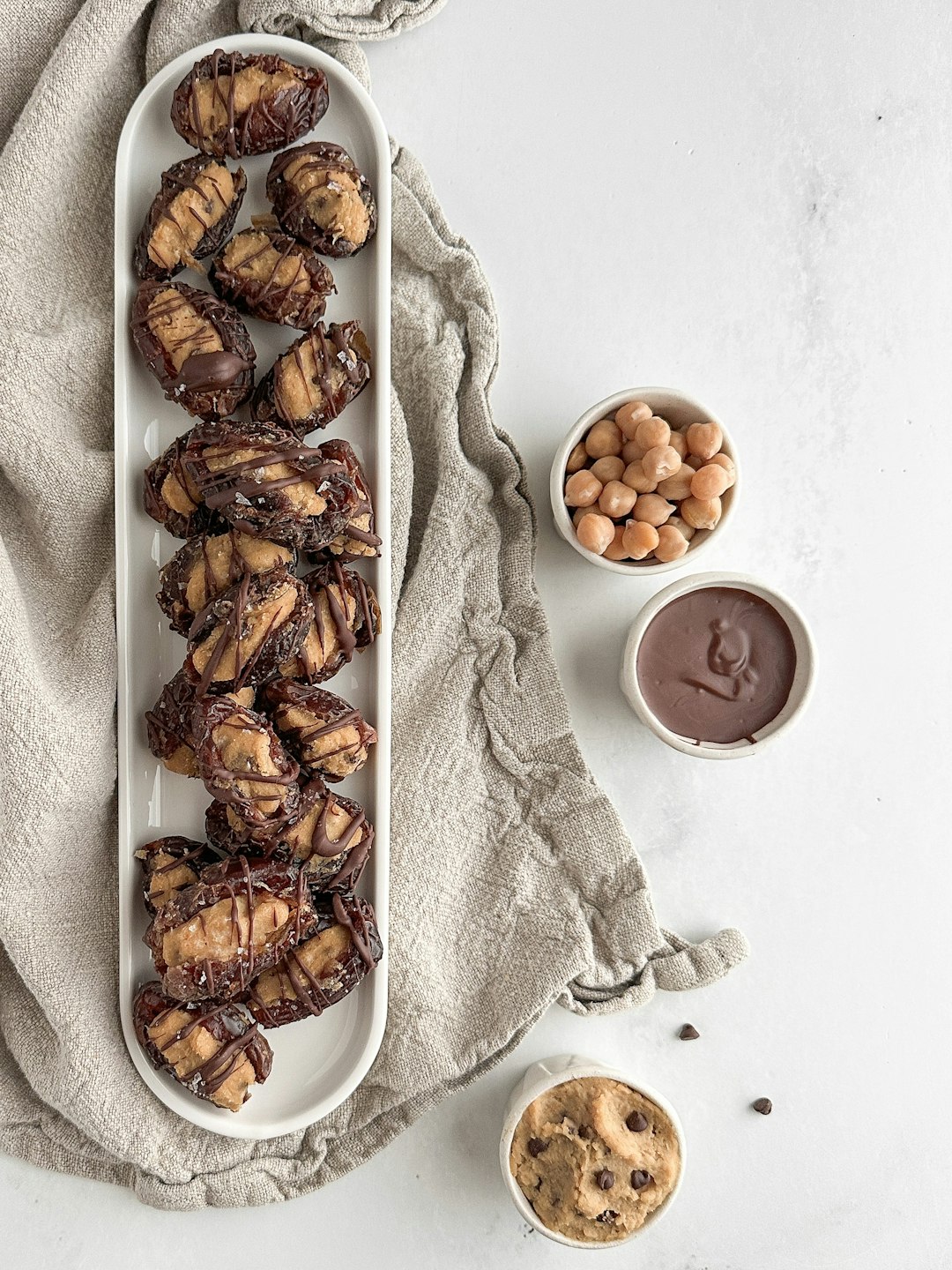 Chocolate-drizzled stuffed date bites